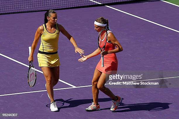 Gisela Dulko of Argentina and Flavia Pennetta of Italy play against Samantha Stosur of Australia and Nadia Petrova of Russia during the women's...