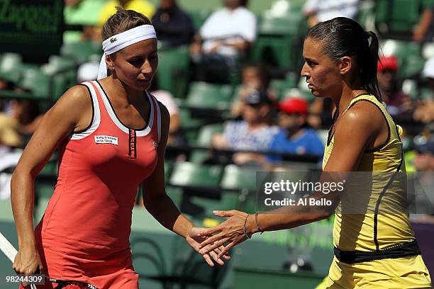 Gisela Dulko of Argentina and Flavia Pennetta of Italy play against Samantha Stosur of Australia and Nadia Petrova of Russia during the women's...