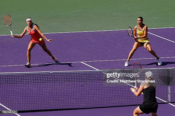 Gisela Dulko of Argentina and Flavia Pennetta of Italy play against Samantha Stosur of Australia and Nadia Petrova of Russia during the women's...