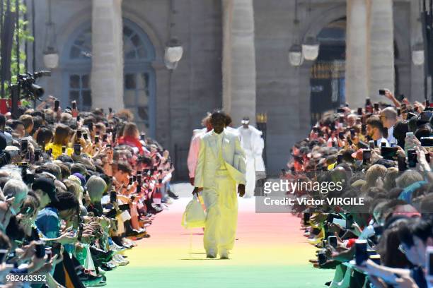 Model walks the runway during the Louis Vuitton Menswear Spring/Summer 2019 fashion show as part of Paris Fashion Week on June 21, 2018 in Paris,...