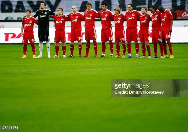Players of FC Lokomotiv Moscow squad line up ahead of the Russian Football League Championship match between FC Lokomotiv Moscow and FC Dynamo Moscow...