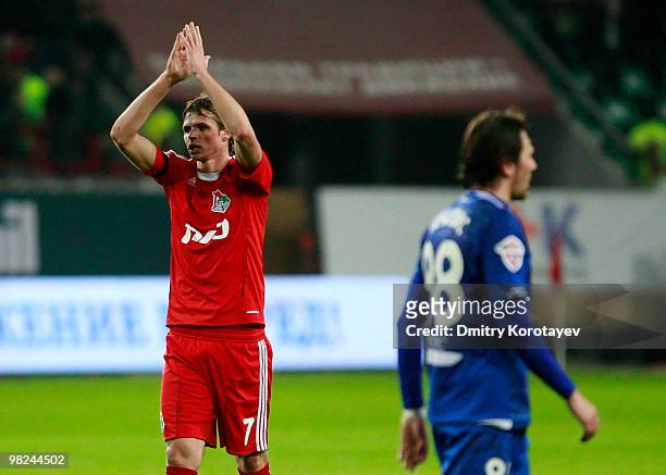 Dmitri Tarasov of FC Lokomotiv Moscow celebrates after their victory over FC Dynamo Moscow in the Russian Football League Championship match between...