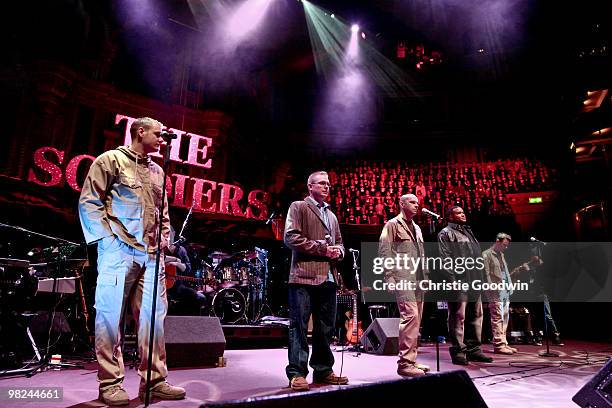 Ryan Idzi, Richard Scarlett, Gary Chilton, Tyrone Basnight and Richie Maddocks perform at the Royal Albert Hall. Idzi is a lance corporal, Maddock a...