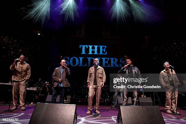 Ryan Idzi, Richard Scarlett, Gary Chilton, Tyrone Basnight and Richie Maddocks perform at the Royal Albert Hall. Idzi is a lance corporal, Maddock a...