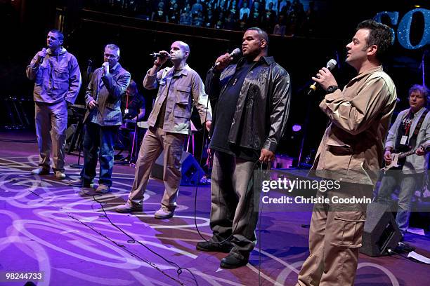 Ryan Idzi, Richard Scarlett, Gary Chilton, Tyrone Basnight and Richie Maddocks perform at the Royal Albert Hall. Idzi is a lance corporal, Maddock a...