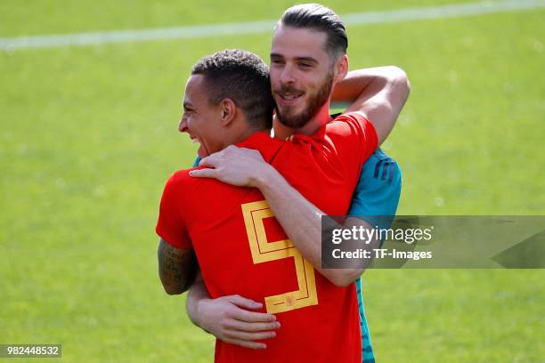 David De Gea of Spain hugs Rodrigo Moreno of Spain during a training session on June 6, 2018 in Madrid, Spain.