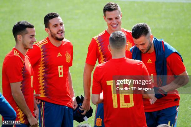 Koke Resurreccion of Spain, Lucas Vazquez of Spain, Cesar Azpilicueta of Spain, Nacho Gernandez of Spain and Jordi Alba of Spain laugh during a...