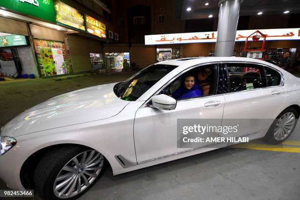 Saudi Samira Al-Ghamdi is seen in her car with family driving at food court in the coastal city of Jeddah for the first time. Little after midnight...