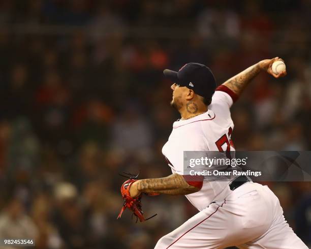 Hector Velazquez of the Boston Red Sox pitches at the top of the fifth inning of the game against the Seattle Mariners at Fenway Park on June 23,...