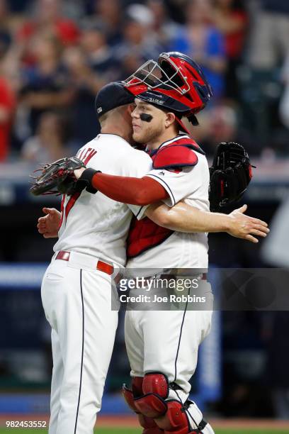 Cody Allen and Roberto Perez of the Cleveland Indians celebrate after the game against the Detroit Tigers at Progressive Field on June 23, 2018 in...