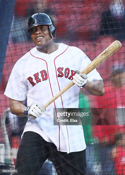 Producer and musician Dr. Dre takes batting practice before the Boston Red Sox take on the the New York Yankees on April 4, 2010 during Opening Night...