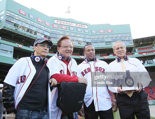 Interscope and Geffen Records chairman Jimmy Iovine, Producer and musician Dr. Dre and Monster founder Noel Lee pose with the Boston Red Sox...