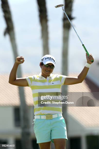 Yani Tseng of Taiwan celebrates after making the final putt suring the final round of the Kraft Nabisco Championship at Mission Hills Country Club on...