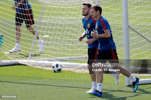 Saul Niguez of Spain and Cesar Azpilicueta of Spain run during a training session on May 31, 2018 in Madrid, Spain.