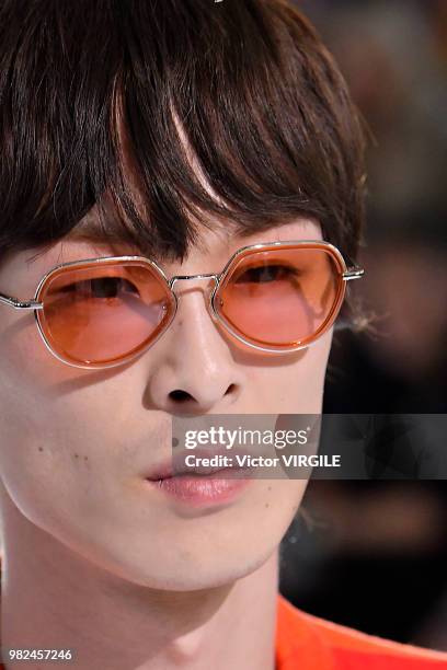 Model walks the runway during the Dries Van Noten Menswear Spring/Summer 2019 fashion show as part of Paris Fashion Week on June 21, 2018 in Paris,...