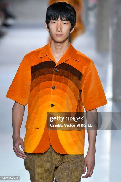 Model walks the runway during the Dries Van Noten Menswear Spring/Summer 2019 fashion show as part of Paris Fashion Week on June 21, 2018 in Paris,...