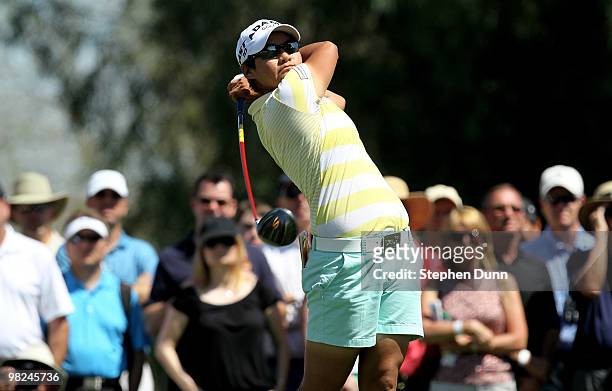 Yani Tseng of Taiwan hits her tee shot on the 16th hole during the final round of the Kraft Nabisco Championship at Mission Hills Country Club on...