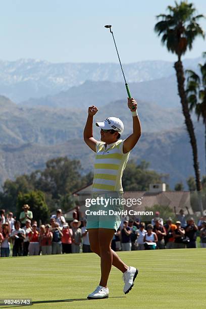 Yani Tseng of Taiwan celebrates after holing the winning putt on the 18th green during the final round of the 2010 Kraft Nabisco Championship, on the...