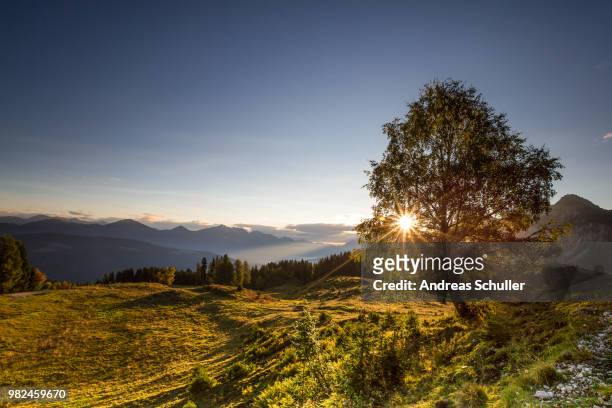 sunrise at nassfeld - schnuller stock pictures, royalty-free photos & images