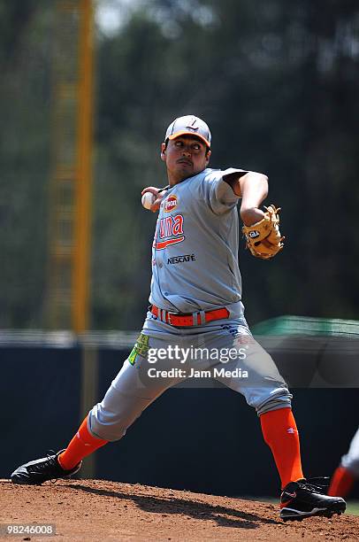 Pitcher Juan Delgadillo of Vaqueros de la Laguna in action during a 2010 Liga Mexicana de Beisebol match between Mexico Red Devils and Vaqueros de la...