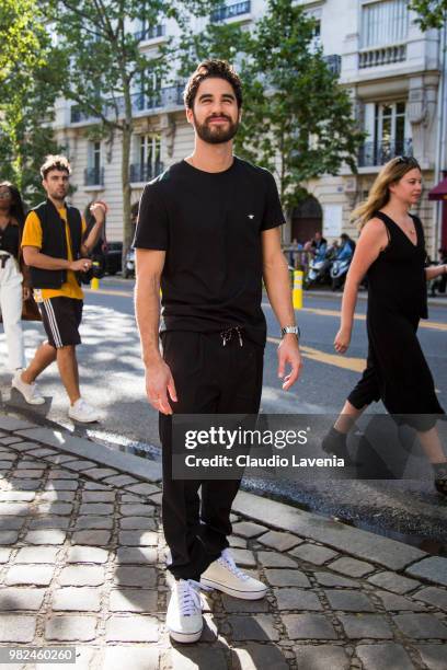 Darren Criss, wearing black t shirt and black pants, is seen in the streets of Paris after the Dior Homme show, during Paris Men's Fashion Week...