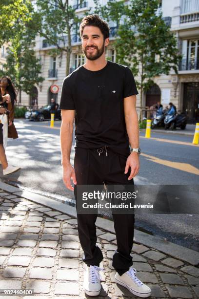 Darren Criss, wearing black t shirt and black pants, is seen in the streets of Paris after the Dior Homme show, during Paris Men's Fashion Week...