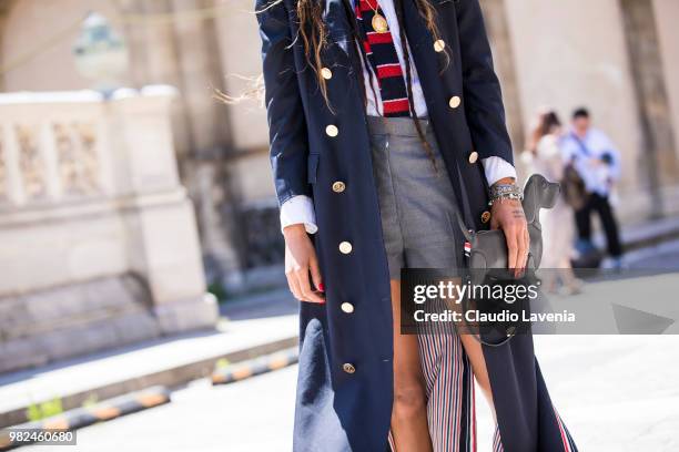 Fashion detail of Adesuwa Aighewi Thom Browne bag, is seen in the streets of Paris before the Thom Browne show, during Paris Men's Fashion Week...