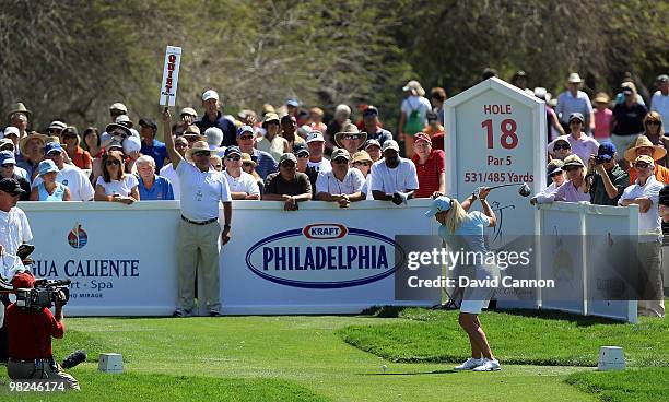 Suzann Petteresen of Norway plays her tee shot on the 18th hole during the final round of the 2010 Kraft Nabisco Championship, on the Dinah Shore...