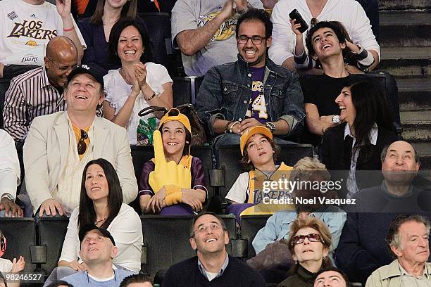 John C. Reilly and his wife Alison Dickey attend a game between the San Antonio Spurs and the Los Angeles Lakers at Staples Center on April 4, 2010...