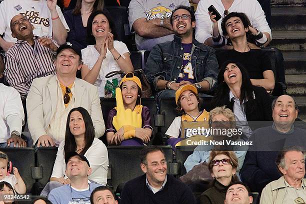 John C. Reilly and his wife Alison Dickey attend a game between the San Antonio Spurs and the Los Angeles Lakers at Staples Center on April 4, 2010...