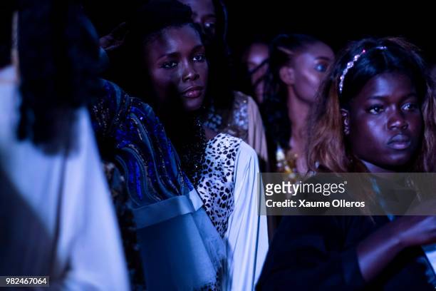 Models get ready during day three of the 16 Dakar Fashion Week at Radison Blu Hotel on June 23, 2018 in Dakar, Senegal.