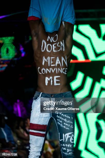 Mode walks on the runway during the Magents show of the 16 Dakar Fashion Week at Radison Blu Hotel on June 23, 2018 in Dakar, Senegal.