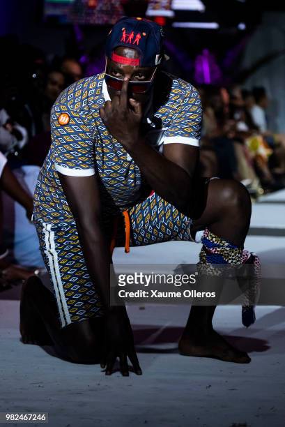 Mode walks on the runway during the Magents show of the 16 Dakar Fashion Week at Radison Blu Hotel on June 23, 2018 in Dakar, Senegal.