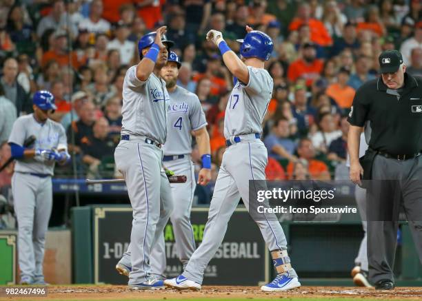 Kansas City Royals first baseman Hunter Dozier hit a home run, allowing \1Kansas City Royals catcher Salvador Perez and Kansas City Royals left...