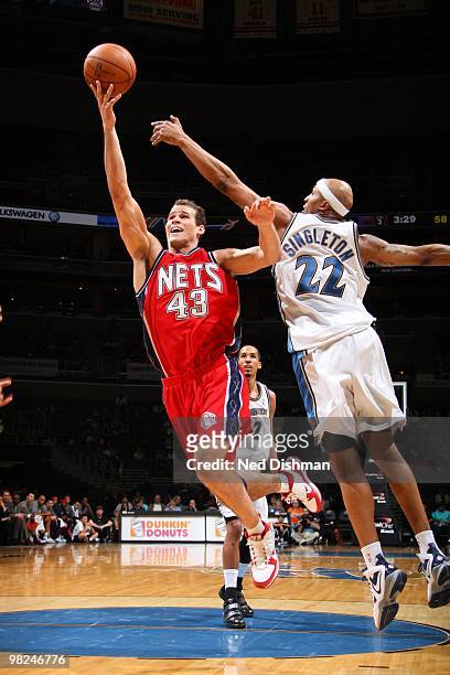 Kris Humphries of the New Jersey Nets shoots against James Singleton of the Washington Wizards at the Verizon Center on April 4, 2010 in Washington,...