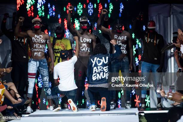 Mode walks on the runway during the Magents show of the 16th Dakar Fashion Week at Radison Blu Hotel on June 23, 2018 in Dakar, Senegal.