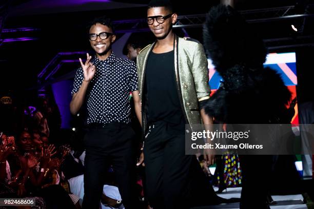 Quiteria & George greet the crowd after their show at the 16th Dakar Fashion Week at Radison Blu Hotel on June 23, 2018 in Dakar, Senegal.