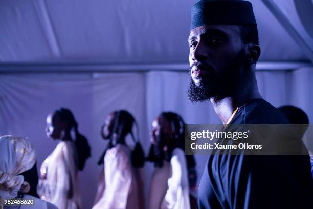 Models get ready during day three of the 16th Dakar Fashion Week at Radison Blu Hotel on June 23, 2018 in Dakar, Senegal.