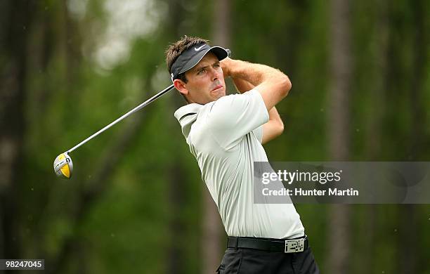 Charl Schwartzel of South Africa hits his tee shot on the sixth hole during the final round of the Shell Houston Open at Redstone Golf Club on April...