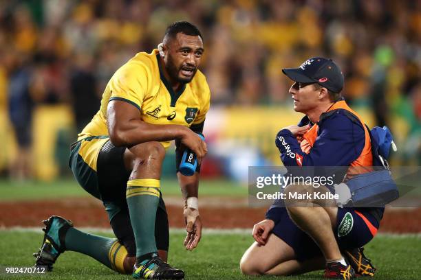 Sekope Kepu of the Wallabies receives attention from the trainer during the Third International Test match between the Australian Wallabies and...