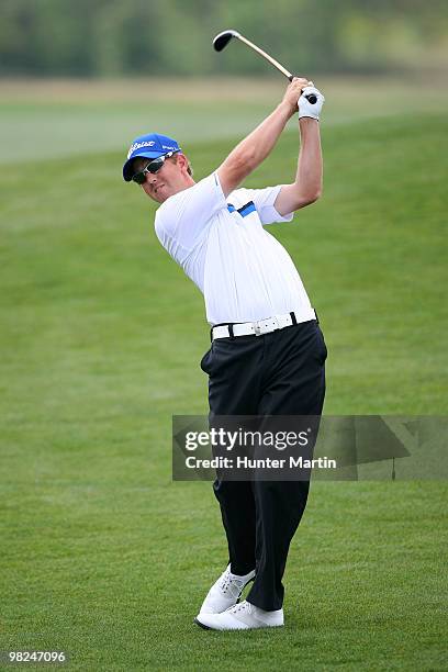 Bryce Molder hits his second shot on the eighth hole during the final round of the Shell Houston Open at Redstone Golf Club on April 4, 2010 in...