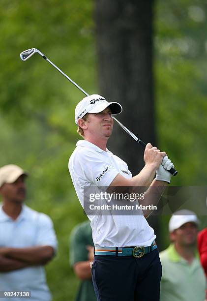 Vaughn Taylor watches his tee shot on the 16th hole during the final round of the Shell Houston Open at Redstone Golf Club on April 4, 2010 in...