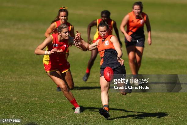 Alyce Parker of the Giants kicks during the round two AFLW Winter Series match between the Gold Coast Suns and the Southern Giants at Southport on...
