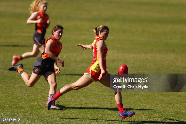 Emma Aeschlimann of the Suns kicks during the round two AFLW Winter Series match between the Gold Coast Suns and the Southern Giants at Southport on...