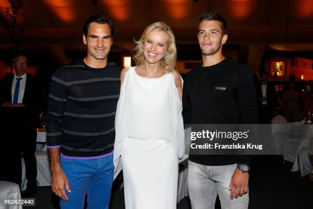 Tennis player Roger Federer, Gerry Weber testimonial international supermodel Eva Herzigova and tennis player Borna Coric attend the Gerry Weber Open...