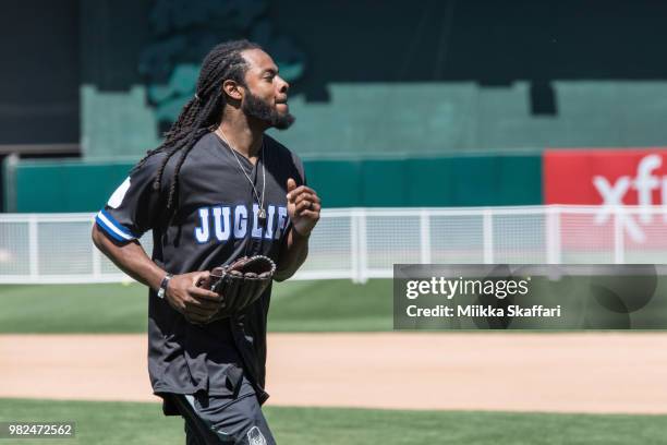 San Francisco 49ers cornerback Richard Sherman plays in Water For Life Charity Softball Game at Oakland-Alameda County Coliseum on June 23, 2018 in...