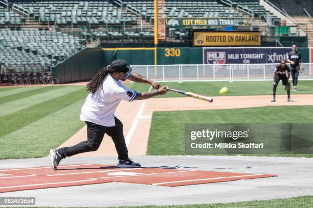 Oakland Raiders running back Marshawn Lynch plays in Water For Life Charity Softball Game at Oakland-Alameda County Coliseum on June 23, 2018 in...
