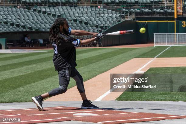 San Francisco 49ers cornerback Richard Sherman plays in Water For Life Charity Softball Game at Oakland-Alameda County Coliseum on June 23, 2018 in...