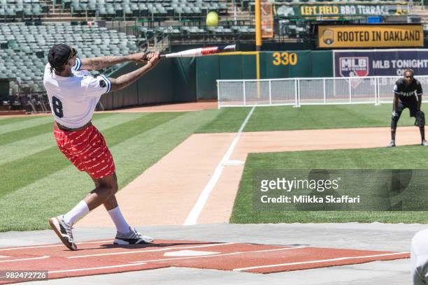 Golden State Warriors guard Nick Young plays in Water For Life Charity Softball Game at Oakland-Alameda County Coliseum on June 23, 2018 in Oakland,...
