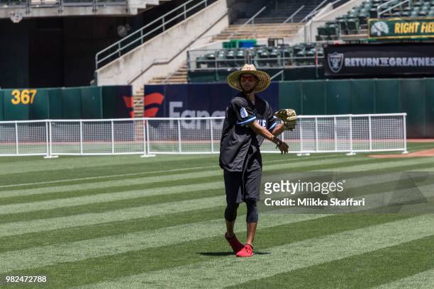 Golden State Warriors point guard Stephen Curry plays in Water For Life Charity Softball Game at Oakland-Alameda County Coliseum on June 23, 2018 in...